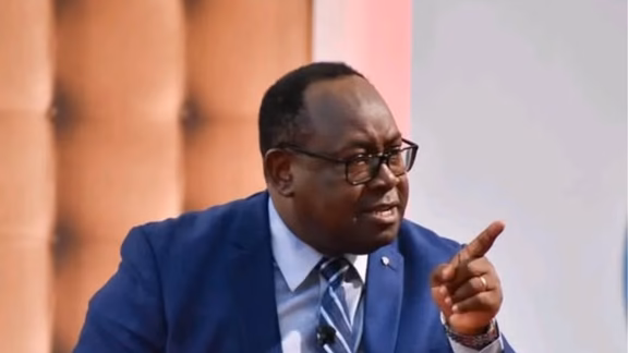 Dr. Kepha Nyamweya Omae speaking during a public discussion.